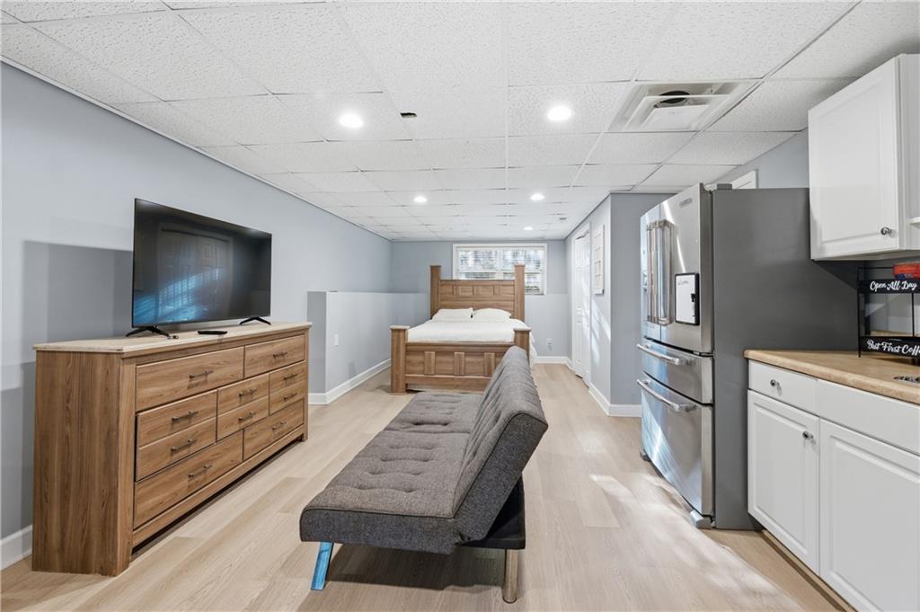 20 Miners Point Acworth, GA 30102 - Photo 18 of 21 a kitchen with stainless steel appliances kitchen island granite countertop a refrigerator and cabinets