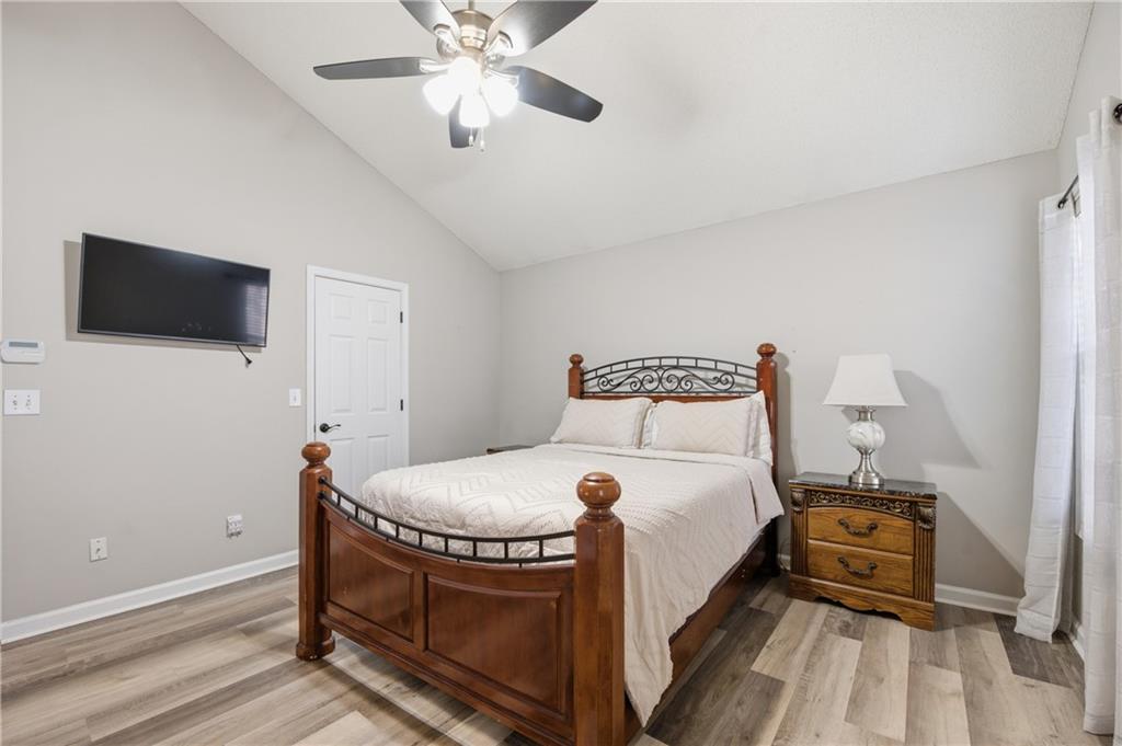 20 Miners Point Acworth, GA 30102 - Photo 9 of 21 a bedroom with a bed and a flat screen tv