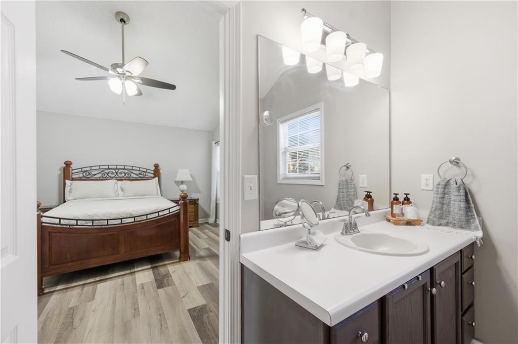 20 Miners Point Acworth, GA 30102 - Photo 10 of 21 a bathroom with a sink and a mirror