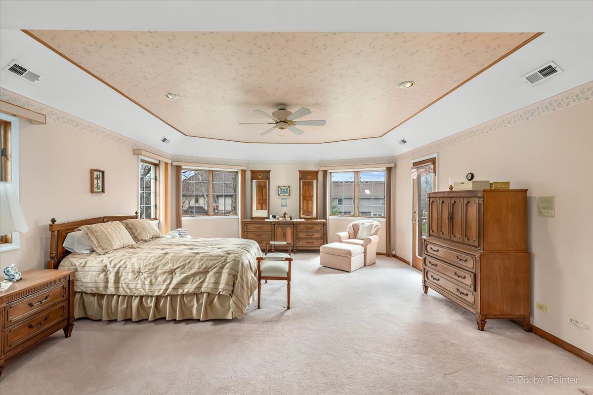26W461 Churchill Road Winfield, IL 60190 - Photo 19 of 60 a bedroom with bed and wooden floor