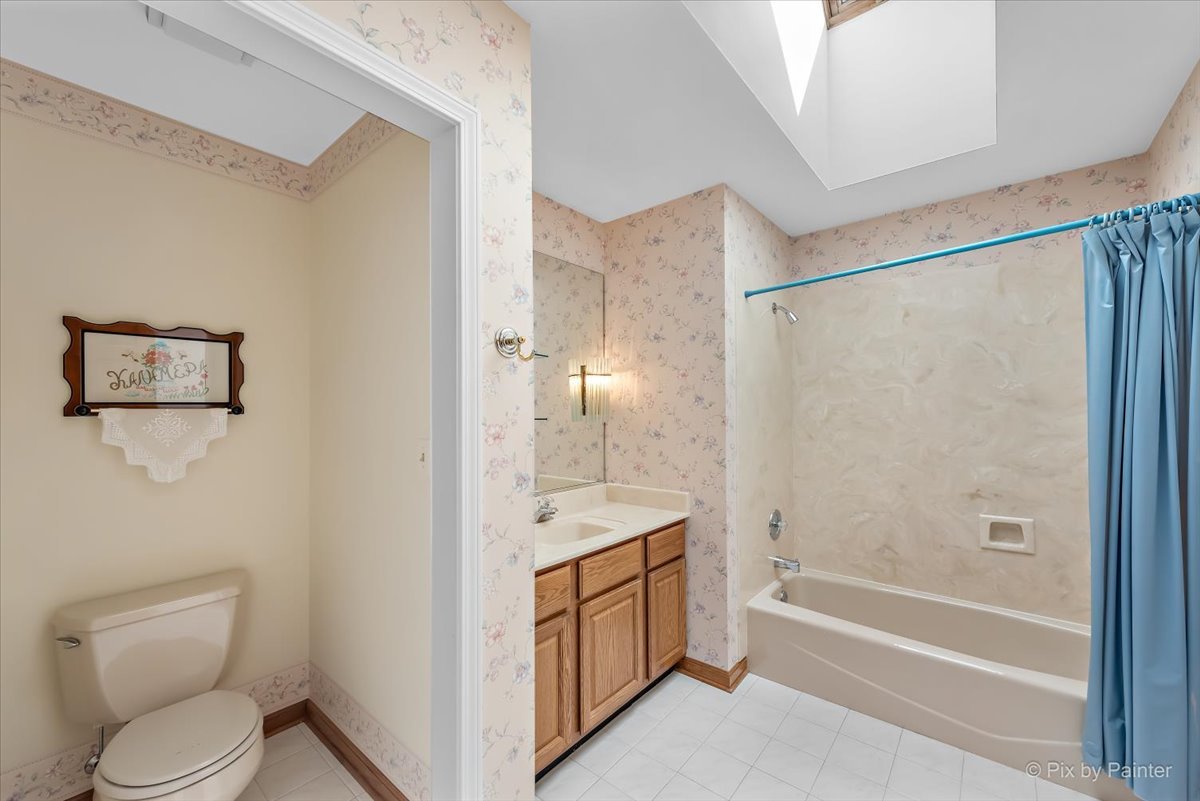 26W461 Churchill Road Winfield, IL 60190 - Photo 28 of 60 a bathroom with a granite countertop sink toilet and shower