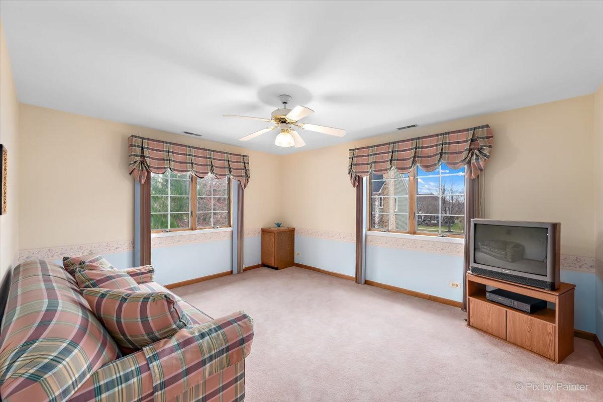 26W461 Churchill Road Winfield, IL 60190 - Photo 30 of 60 a living room with furniture and a window