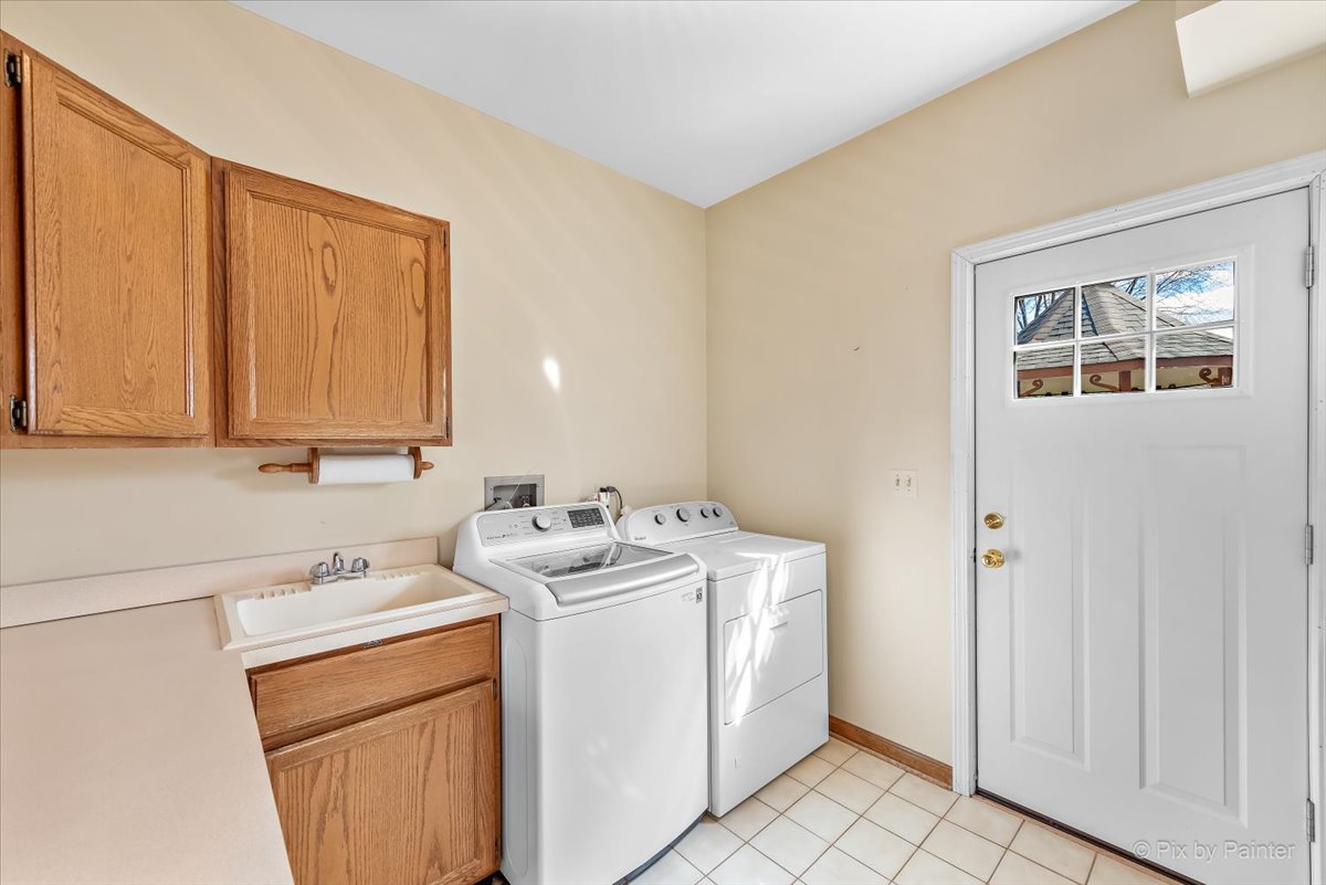 26W461 Churchill Road Winfield, IL 60190 - Photo 32 of 60 a utility room with dryer and washer