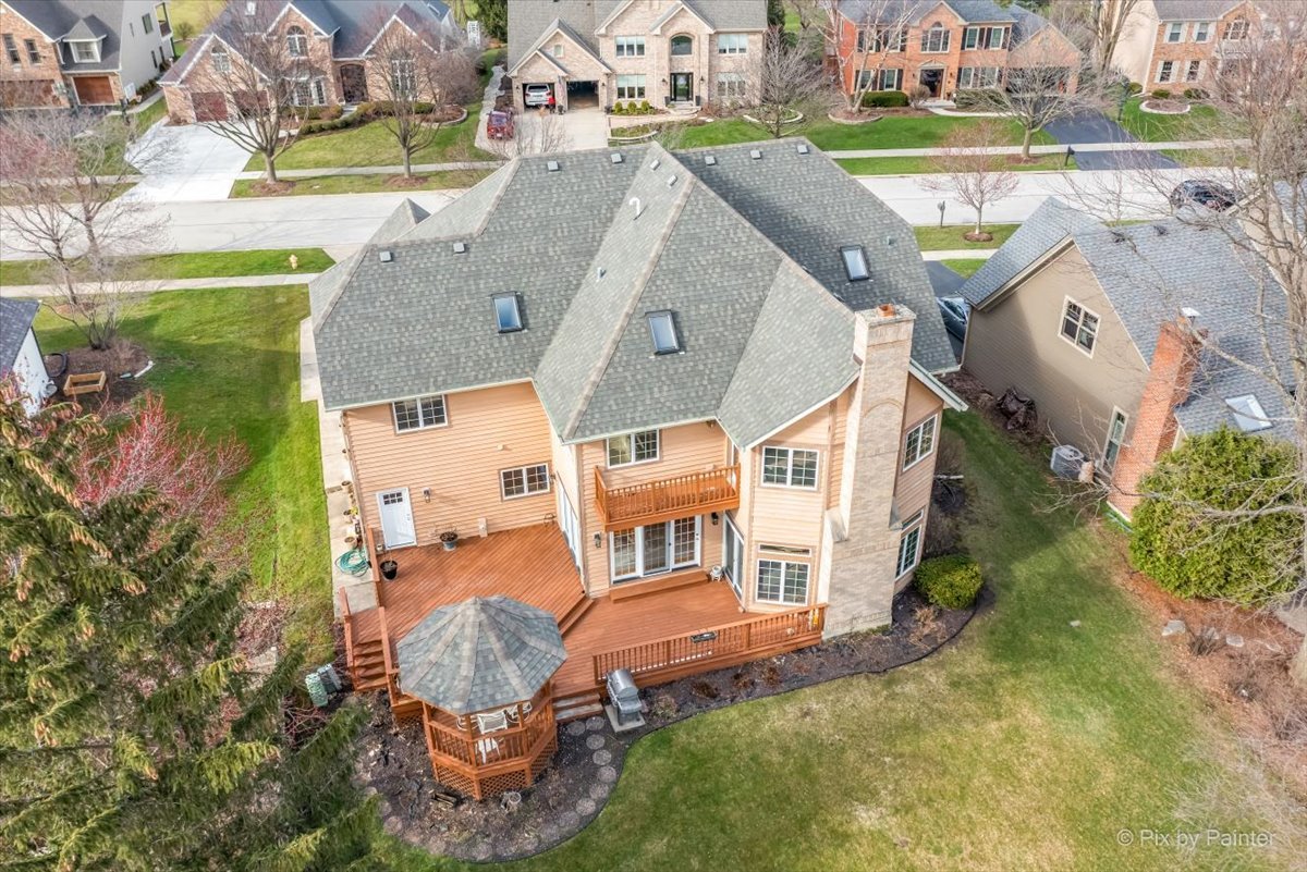 26W461 Churchill Road Winfield, IL 60190 - Photo 47 of 60 an aerial view of a house with a garden and swimming pool