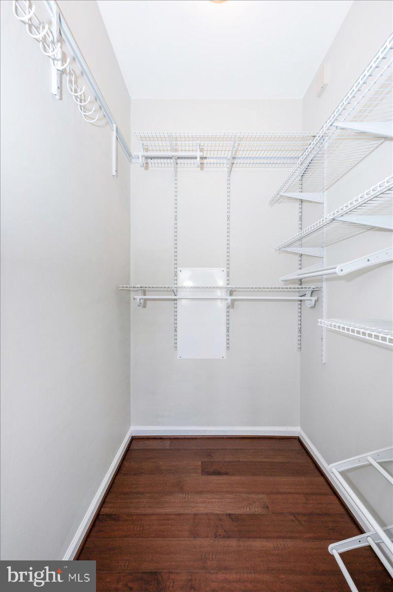 5059 Small Gains Way, Unit 5059 Frederick, MD 21703 - Photo 34 of 57 a view of an empty walk in closet