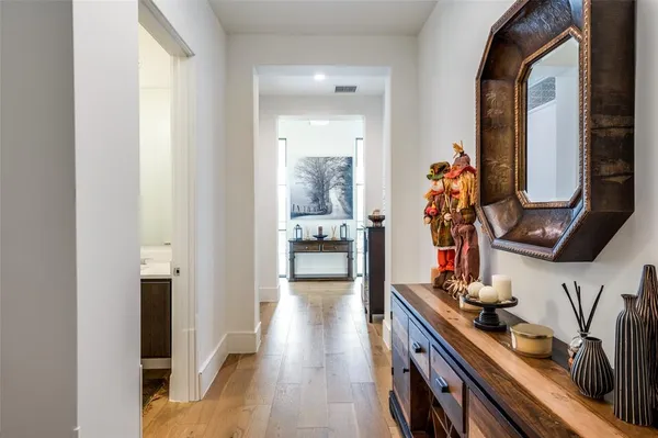 a view of a living room and bathroom