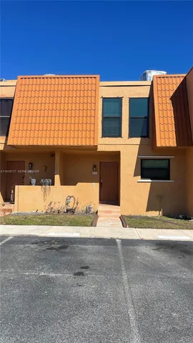 a view of an empty room and balcony