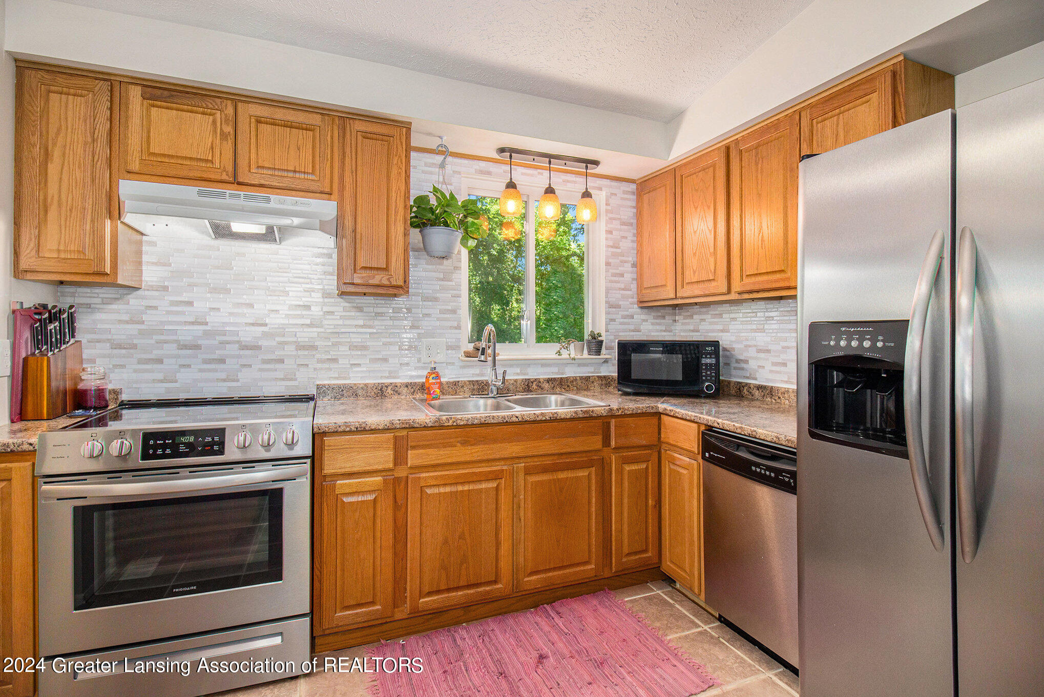 5831 Rockingham Drive Lansing, MI 48911 - Photo 6 of 24 006_img_6463_272