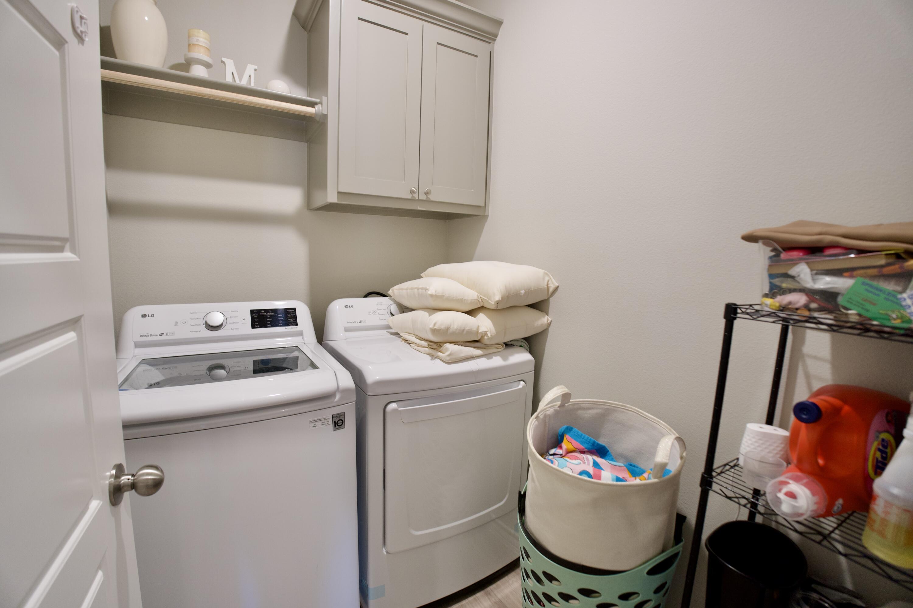 5801 Winfield Avenue Lubbock, TX 79407 - Photo 17 of 20 a utility room with dryer and washer