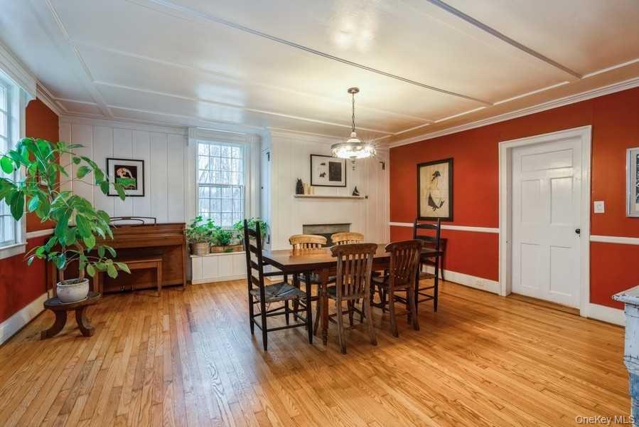 1141 Beekman Road Hopewell Junction, NY 12533 - Photo 12 of 36 a view of a dining room with furniture window and wooden floor