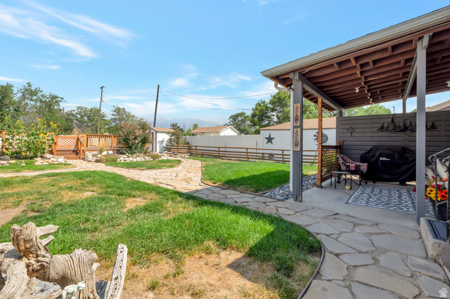 7391 Elm Street Midvale, UT 84047 - Photo 23 of 38 Covered patio featuring a solid roof and concrete flooring