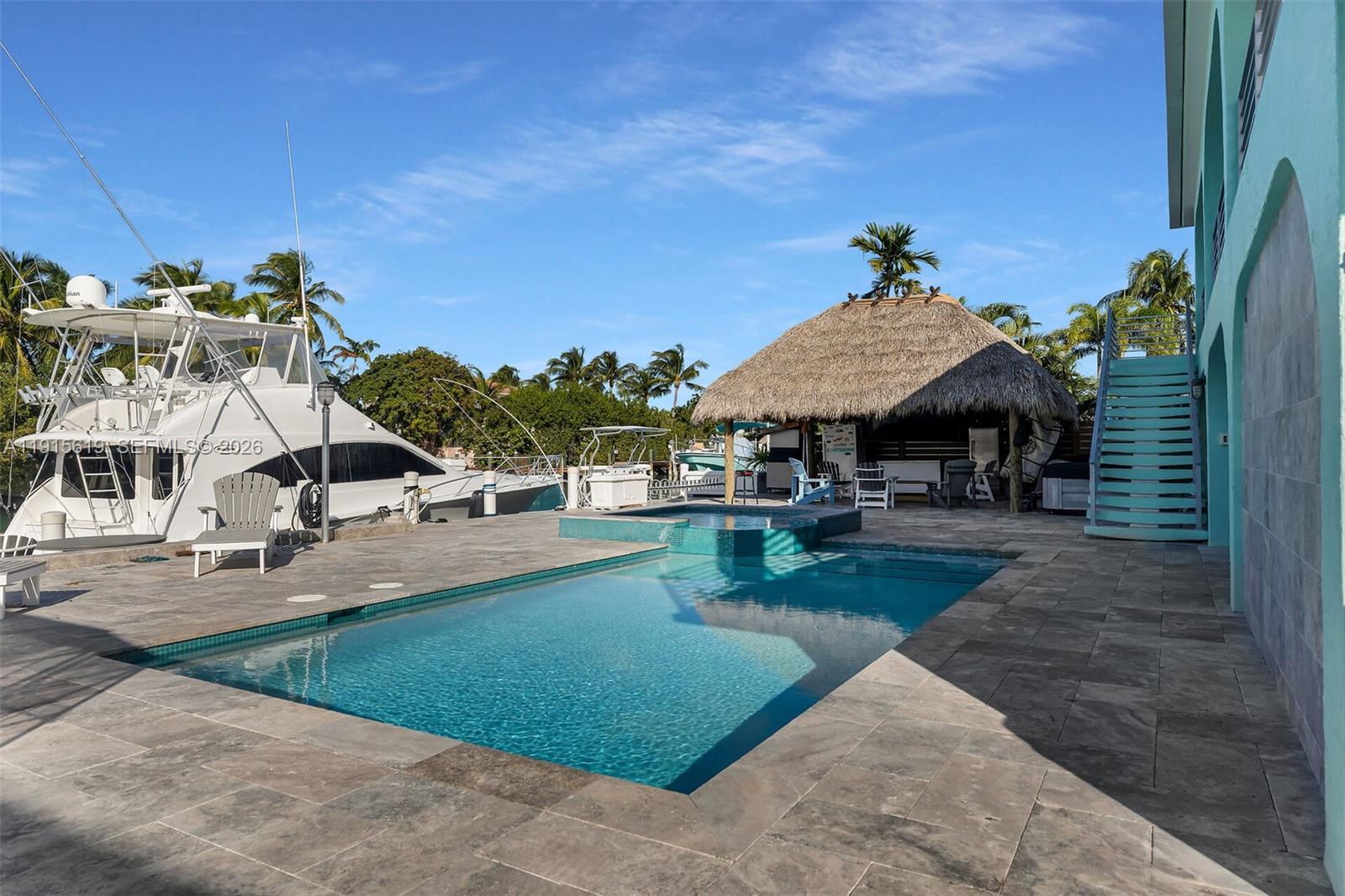232 West Seaview Drive Marathon, FL 33050 - Photo 40 of 72 a view of a house with swimming pool