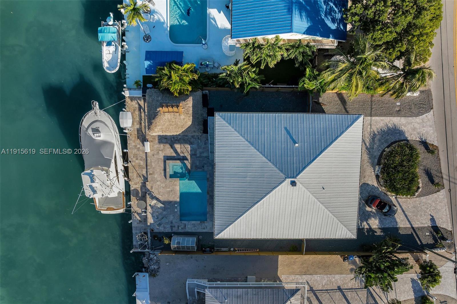 232 West Seaview Drive Marathon, FL 33050 - Photo 71 of 72 an aerial view of a house with a yard and potted plants
