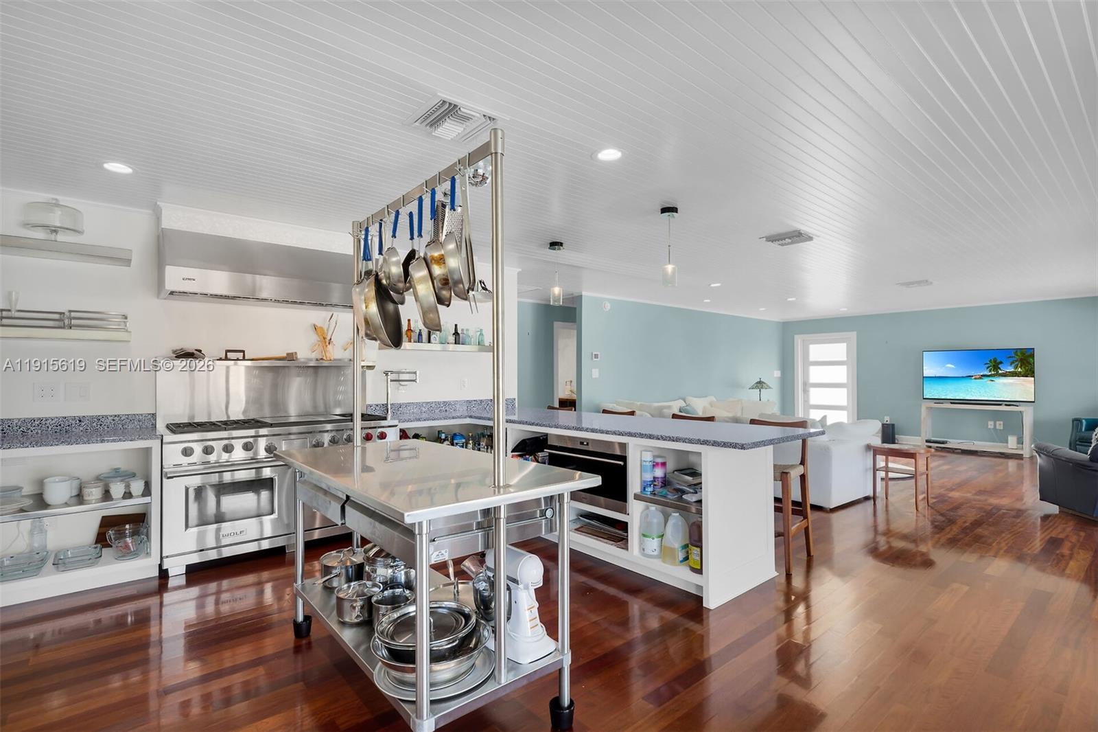 232 West Seaview Drive Marathon, FL 33050 - Photo 10 of 72 a large kitchen with a table and chairs in it