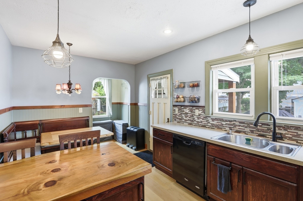 2 Cashman Road Peabody, MA 01960 - Photo 12 of 37 a kitchen with a counter space a sink appliances and a window