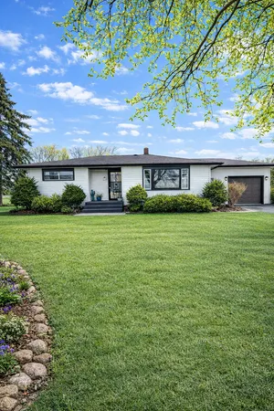 a house view with a garden space