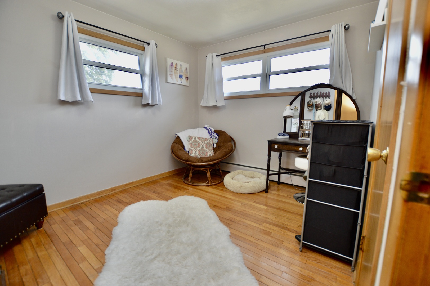 12310 Price Road Hebron, IL 60034 - Photo 11 of 20 a room with wooden floor and furniture