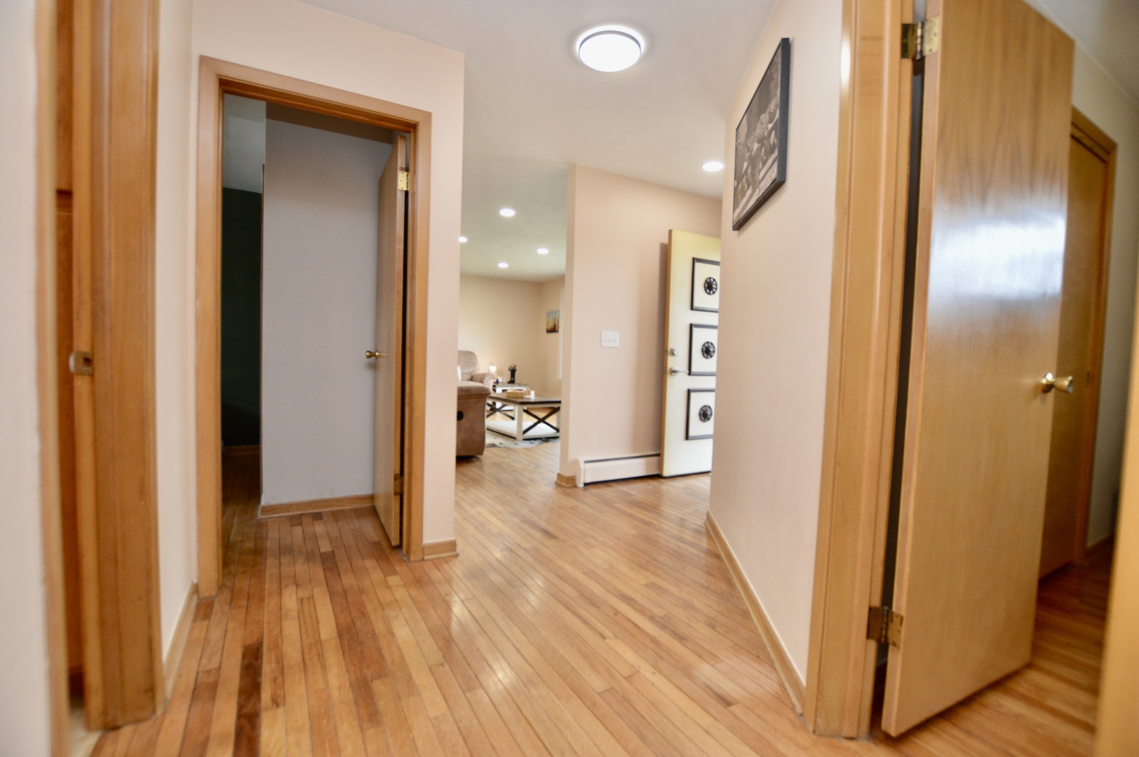 12310 Price Road Hebron, IL 60034 - Photo 13 of 20 a view of a hallway view with wooden floor and staircase