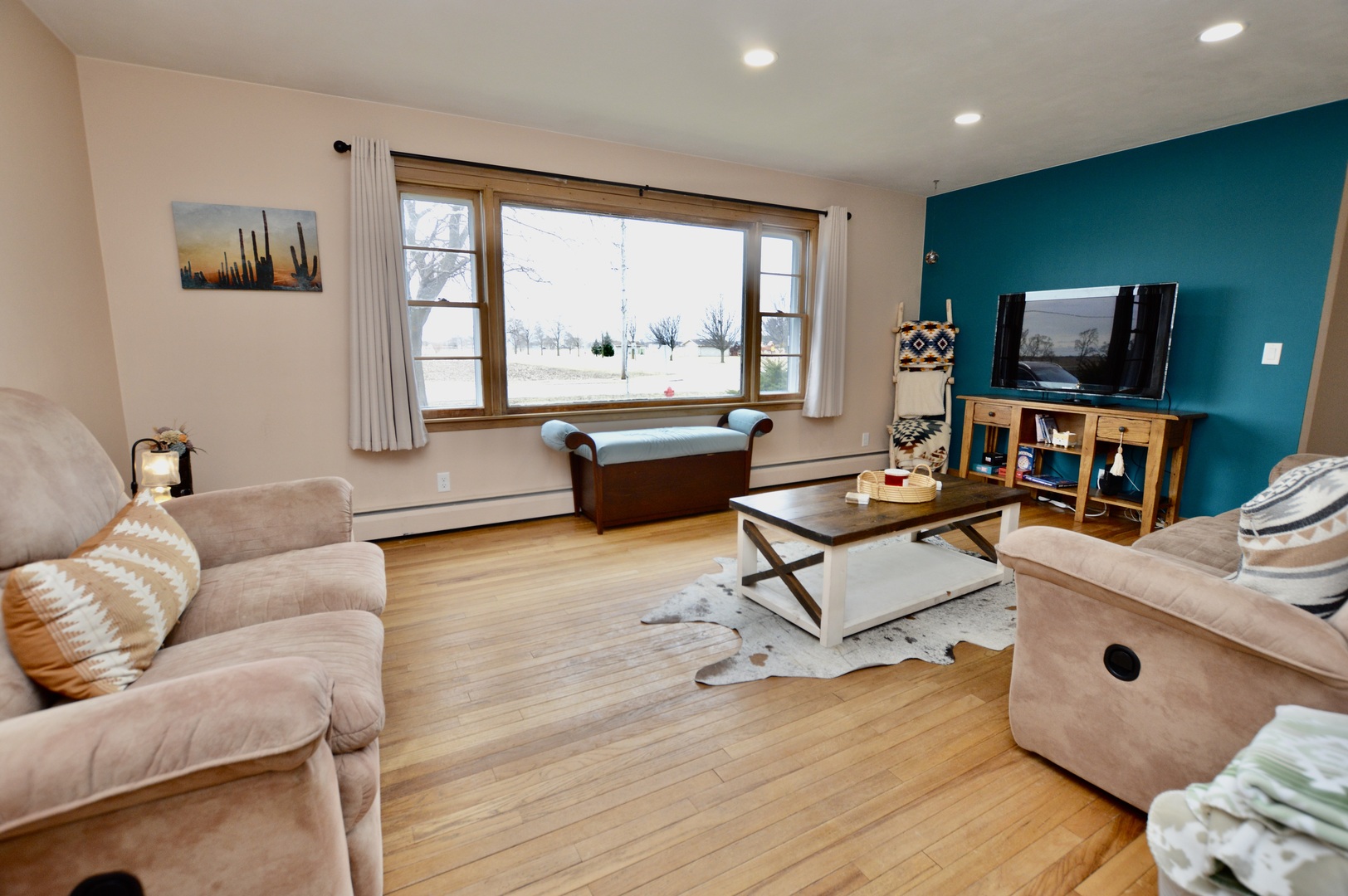 12310 Price Road Hebron, IL 60034 - Photo 6 of 20 a living room with furniture and a flat screen tv