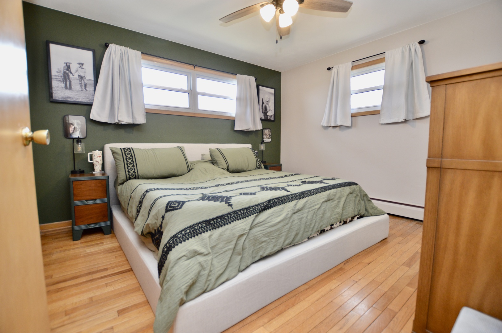 12310 Price Road Hebron, IL 60034 - Photo 10 of 20 a bedroom with a bed and a chandelier
