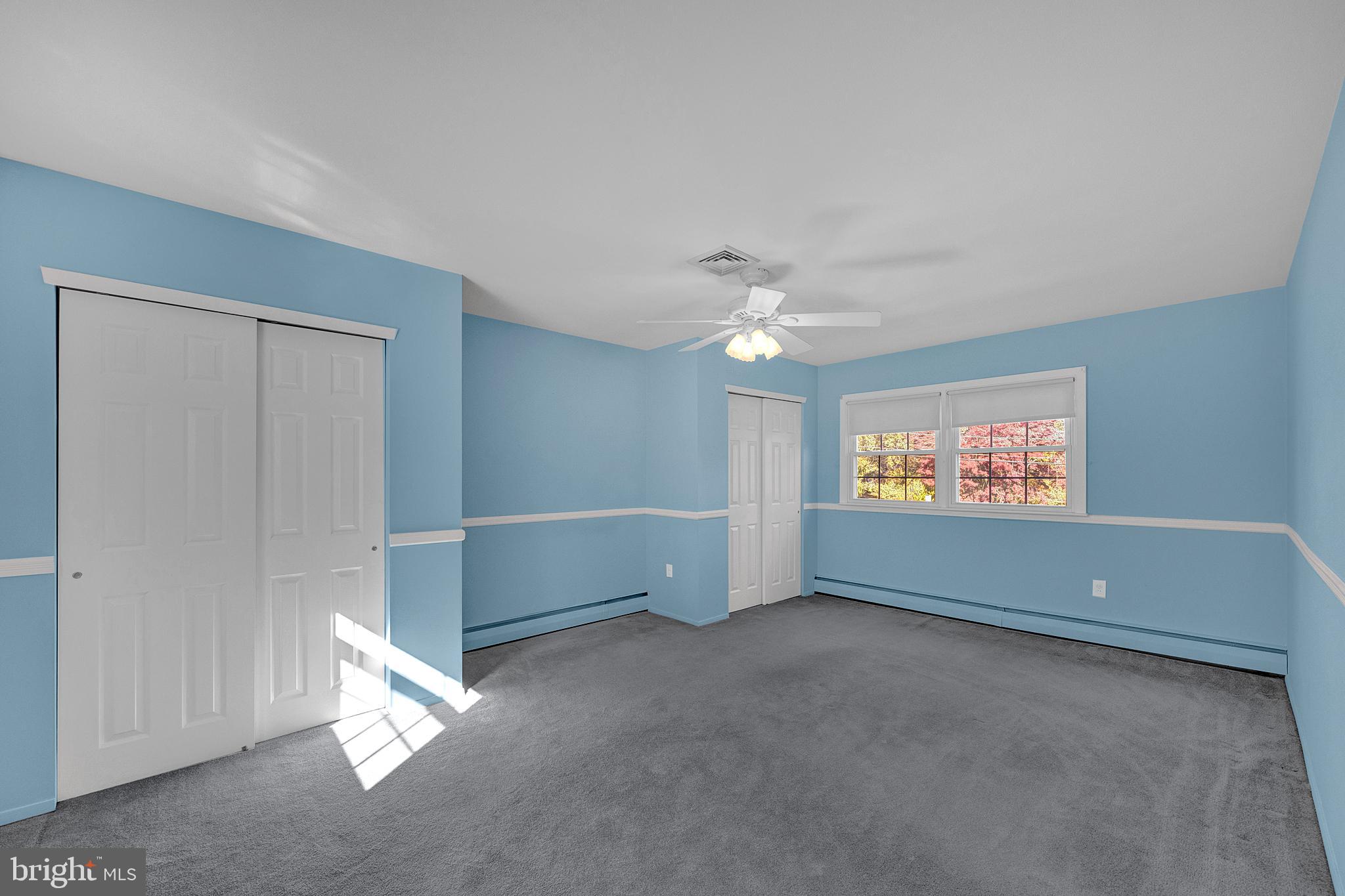 4 Old Forge Lane Ewing, NJ 08618 - Photo 22 of 35 an empty room with windows and fan