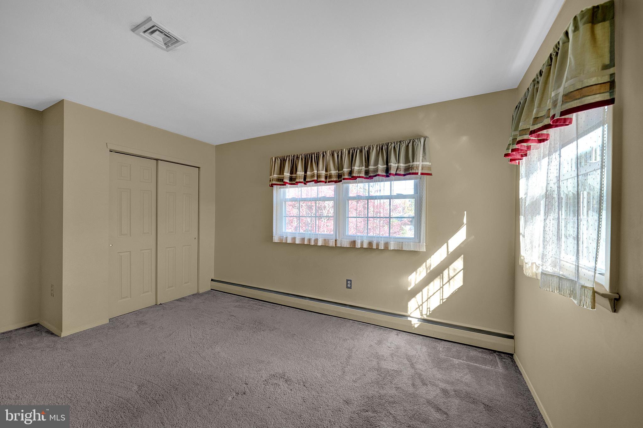 4 Old Forge Lane Ewing, NJ 08618 - Photo 27 of 35 a view of an empty room with a window