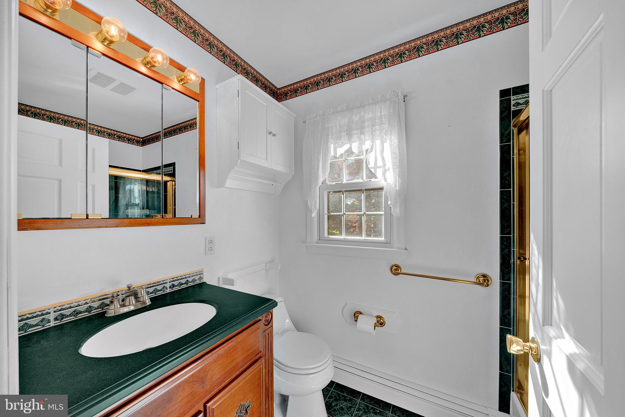 4 Old Forge Lane Ewing, NJ 08618 - Photo 28 of 35 a bathroom with a granite countertop sink and a mirror