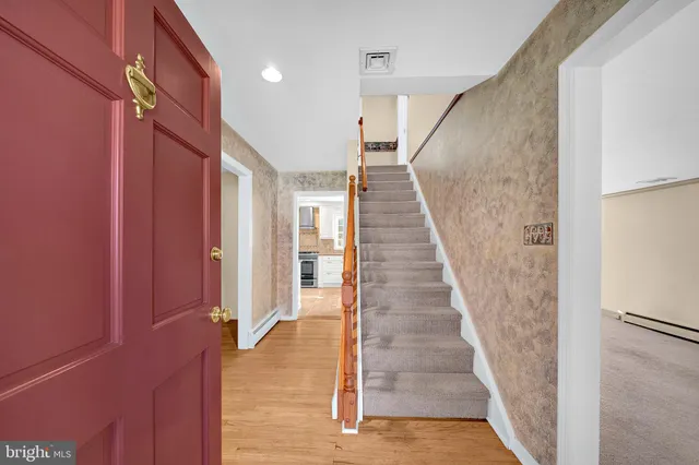 a view of staircase with white walls and white walls