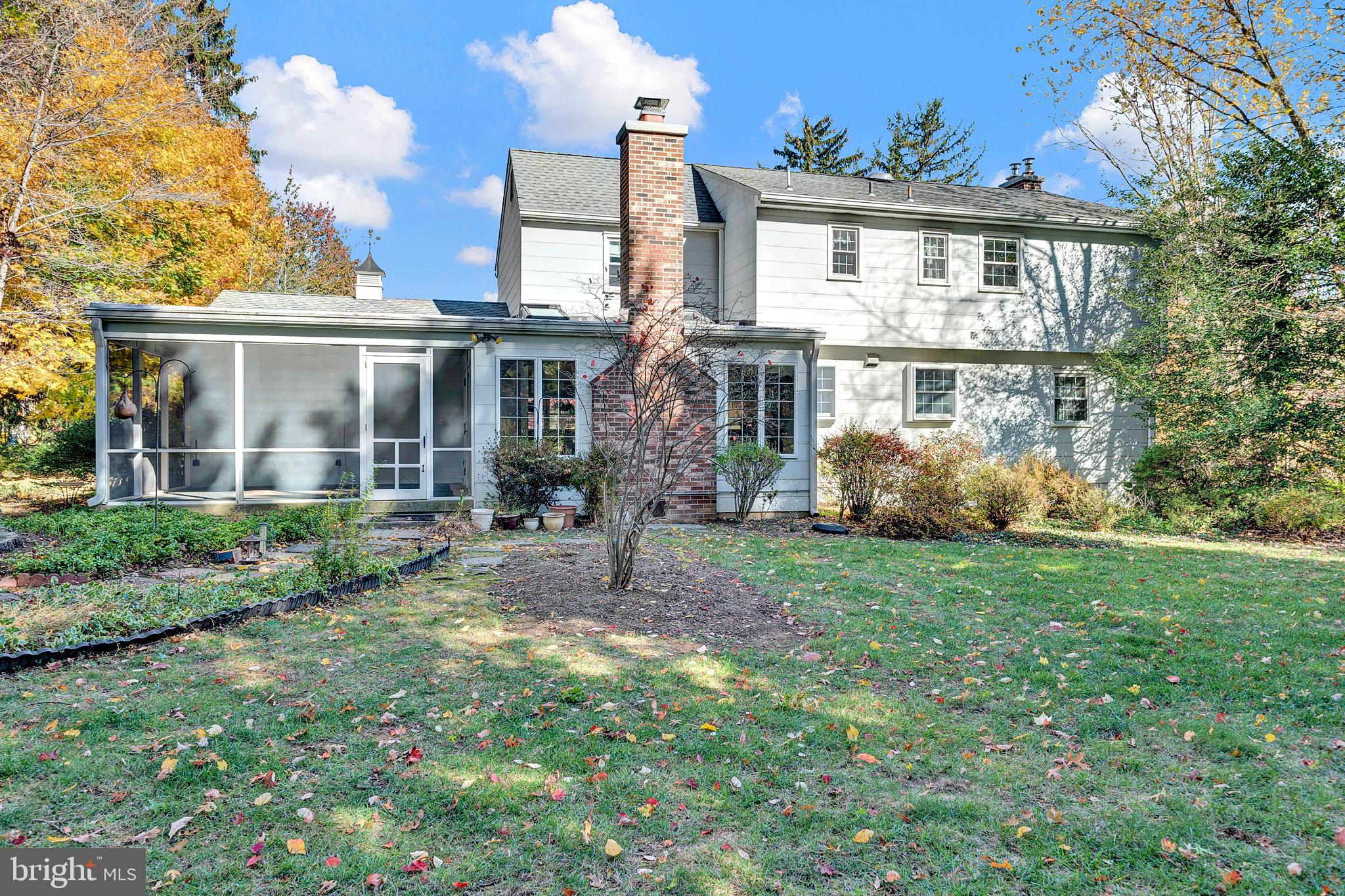 4 Old Forge Lane Ewing, NJ 08618 - Photo 33 of 35 a front view of a house with garden
