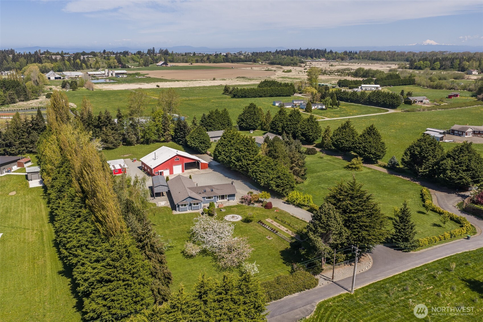 113 Gold Dust Lane Sequim, WA 98382 - Photo 2 of 40 an aerial view of residential houses with outdoor space