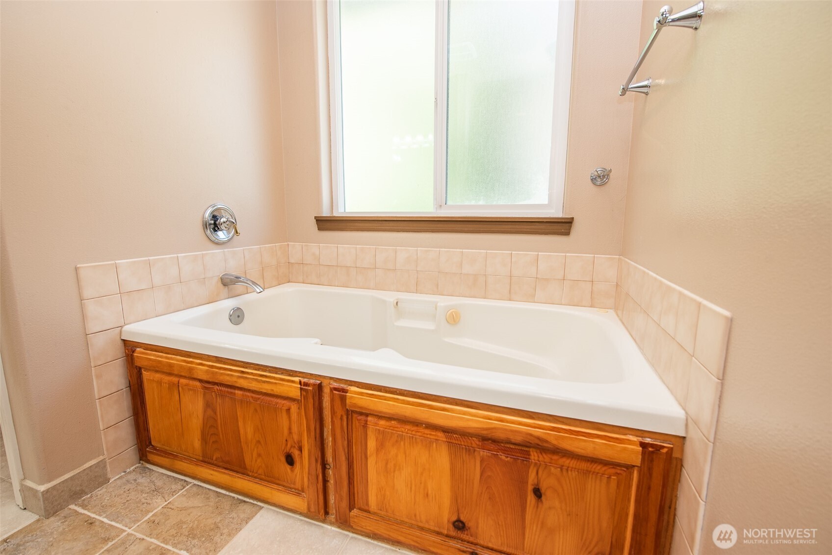 113 Gold Dust Lane Sequim, WA 98382 - Photo 23 of 40 a bathroom with a tub sink and mirror