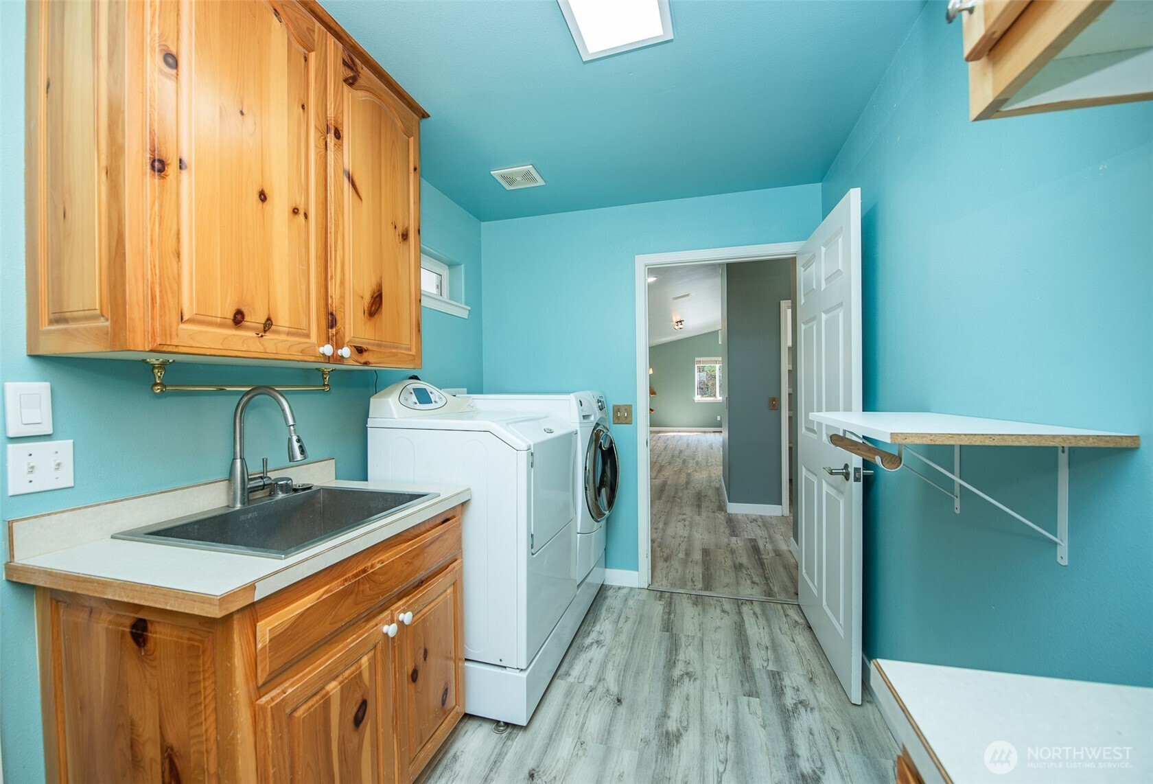 113 Gold Dust Lane Sequim, WA 98382 - Photo 29 of 40 a utility room with washer and dryer