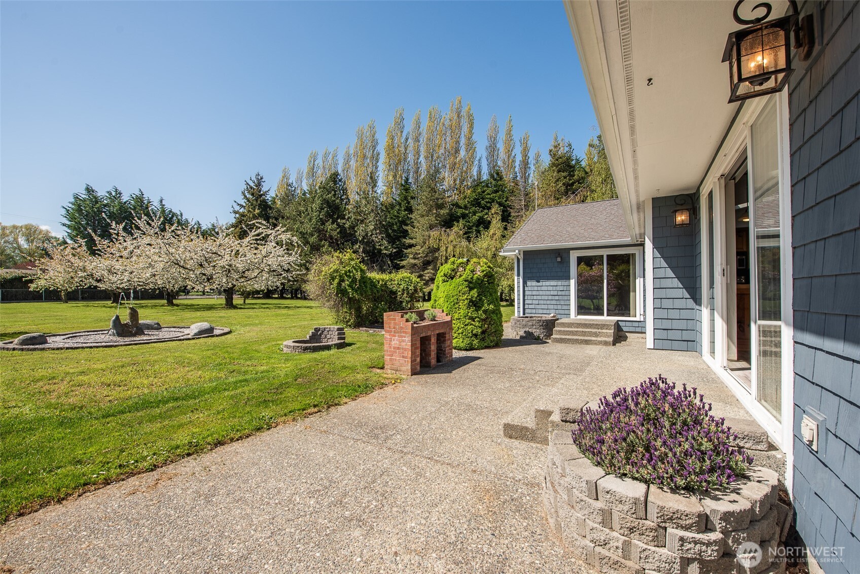 113 Gold Dust Lane Sequim, WA 98382 - Photo 6 of 40 a view of a house with backyard and garden