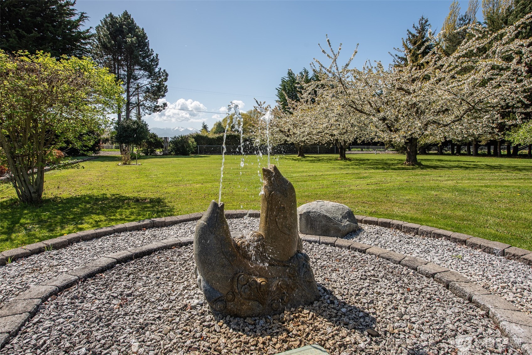 113 Gold Dust Lane Sequim, WA 98382 - Photo 7 of 40 a view of a garden and basketball court