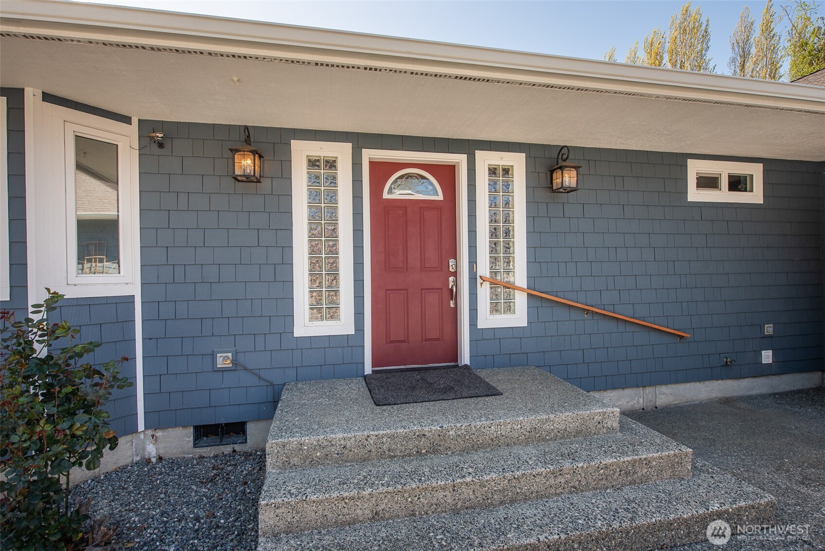 113 Gold Dust Lane Sequim, WA 98382 - Photo 9 of 40 a front view of a house with a yard