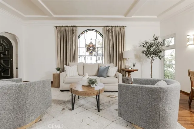 a view of dining room with furniture and wooden floor