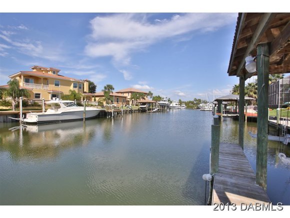 117 Inlet Harbor Road Ponce Inlet, FL 32127 - Photo 20 of 24 a view of a lake with houses
