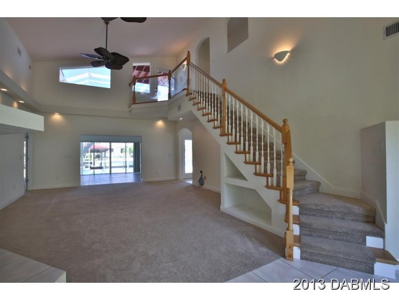 117 Inlet Harbor Road Ponce Inlet, FL 32127 - Photo 2 of 24 a view of entryway and hall with wooden floor