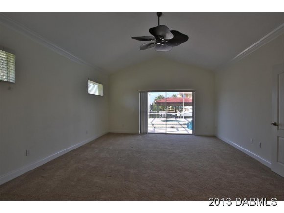 117 Inlet Harbor Road Ponce Inlet, FL 32127 - Photo 21 of 24 a view of an empty room with a window