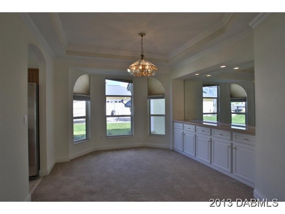 117 Inlet Harbor Road Ponce Inlet, FL 32127 - Photo 6 of 24 a view of a room window and cabinet