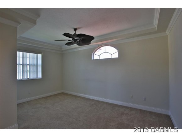 117 Inlet Harbor Road Ponce Inlet, FL 32127 - Photo 9 of 24 a view of an empty room with a window