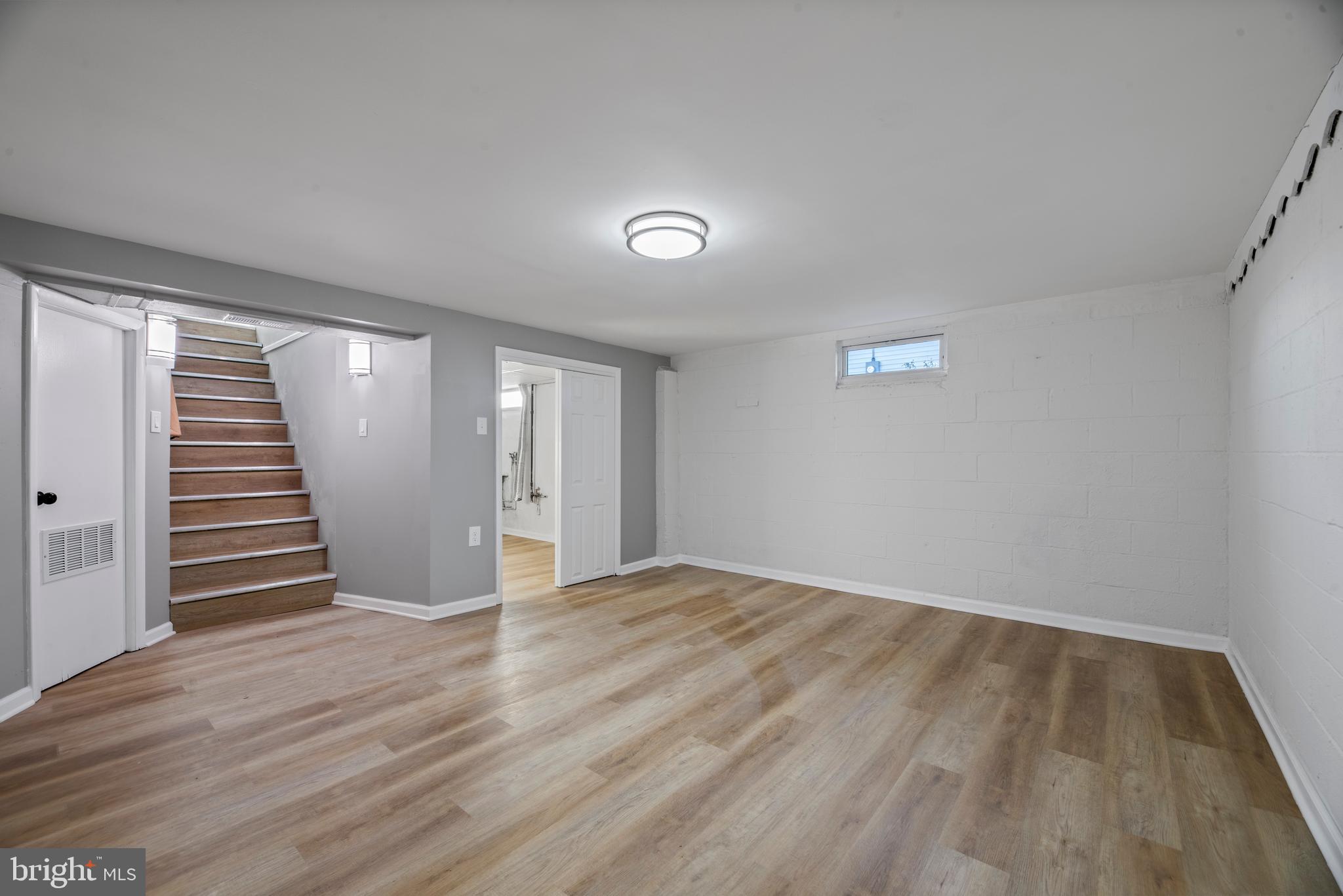 504 River Drive Riverside, NJ 08075 - Photo 19 of 45 wooden floor in an empty room with a window