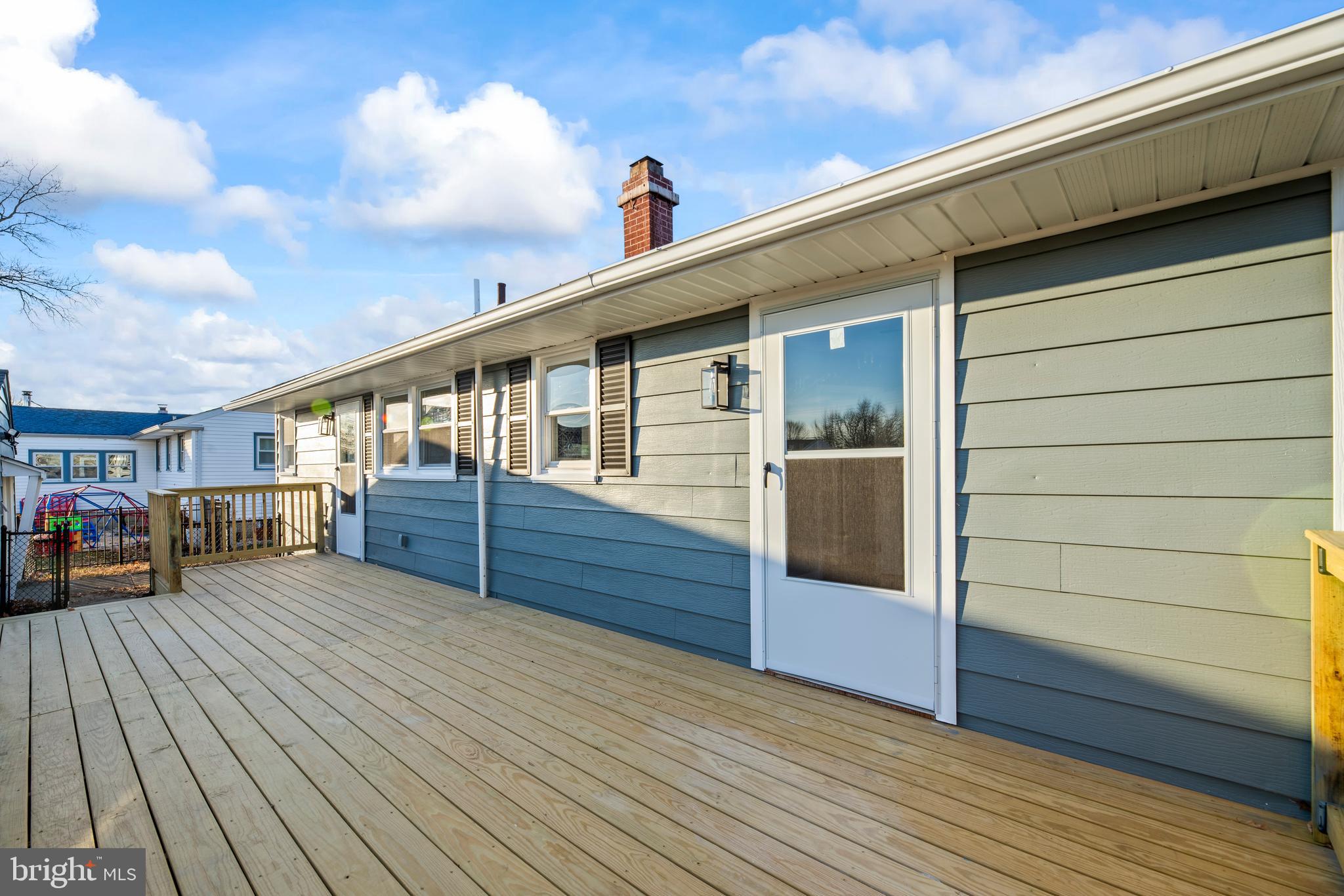 504 River Drive Riverside, NJ 08075 - Photo 28 of 45 a view of a house with wooden deck
