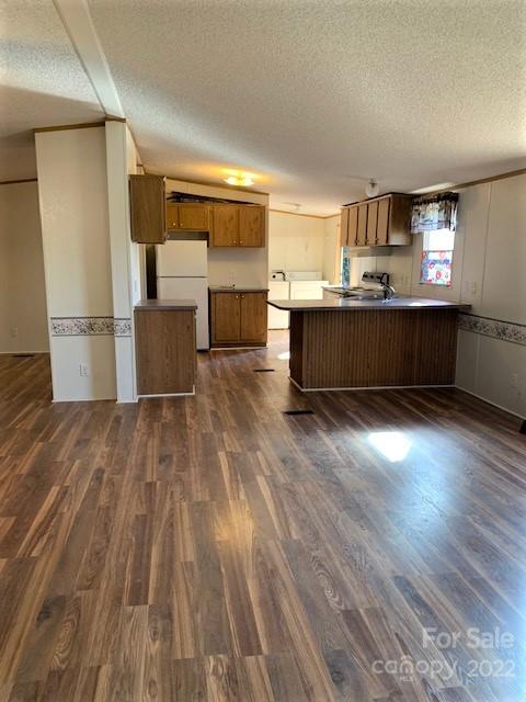 329 Smith Road Columbus, NC 28722 - Photo 9 of 23 a view of kitchen with cabinets and wooden floor