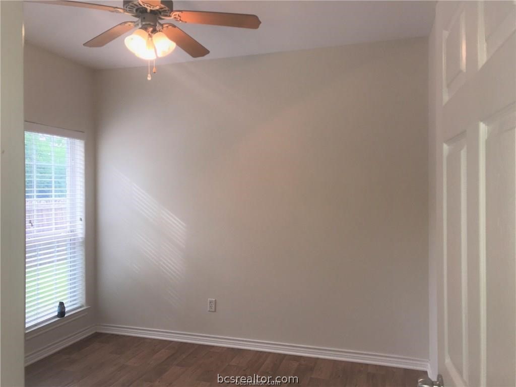 3754 Essen Loop College Station, TX 77845 - Photo 12 of 25 an empty room with windows and fan