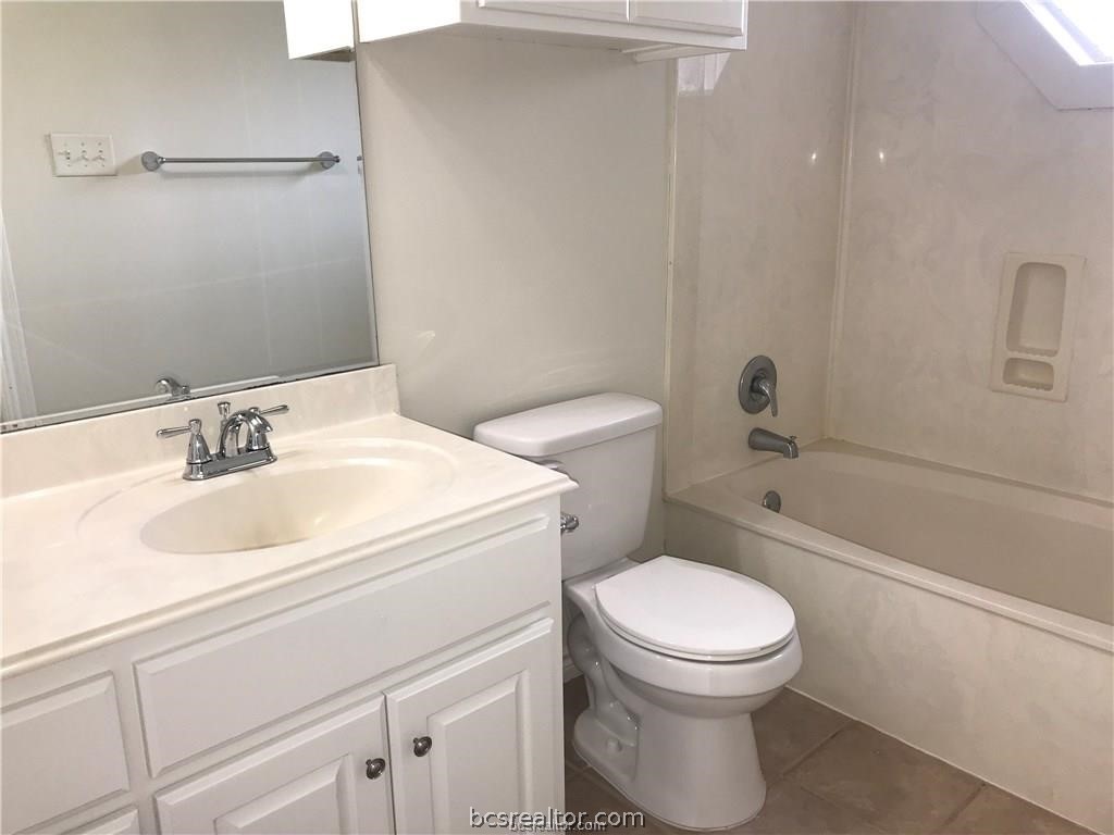 3754 Essen Loop College Station, TX 77845 - Photo 14 of 25 a bathroom with a sink a toilet and shower