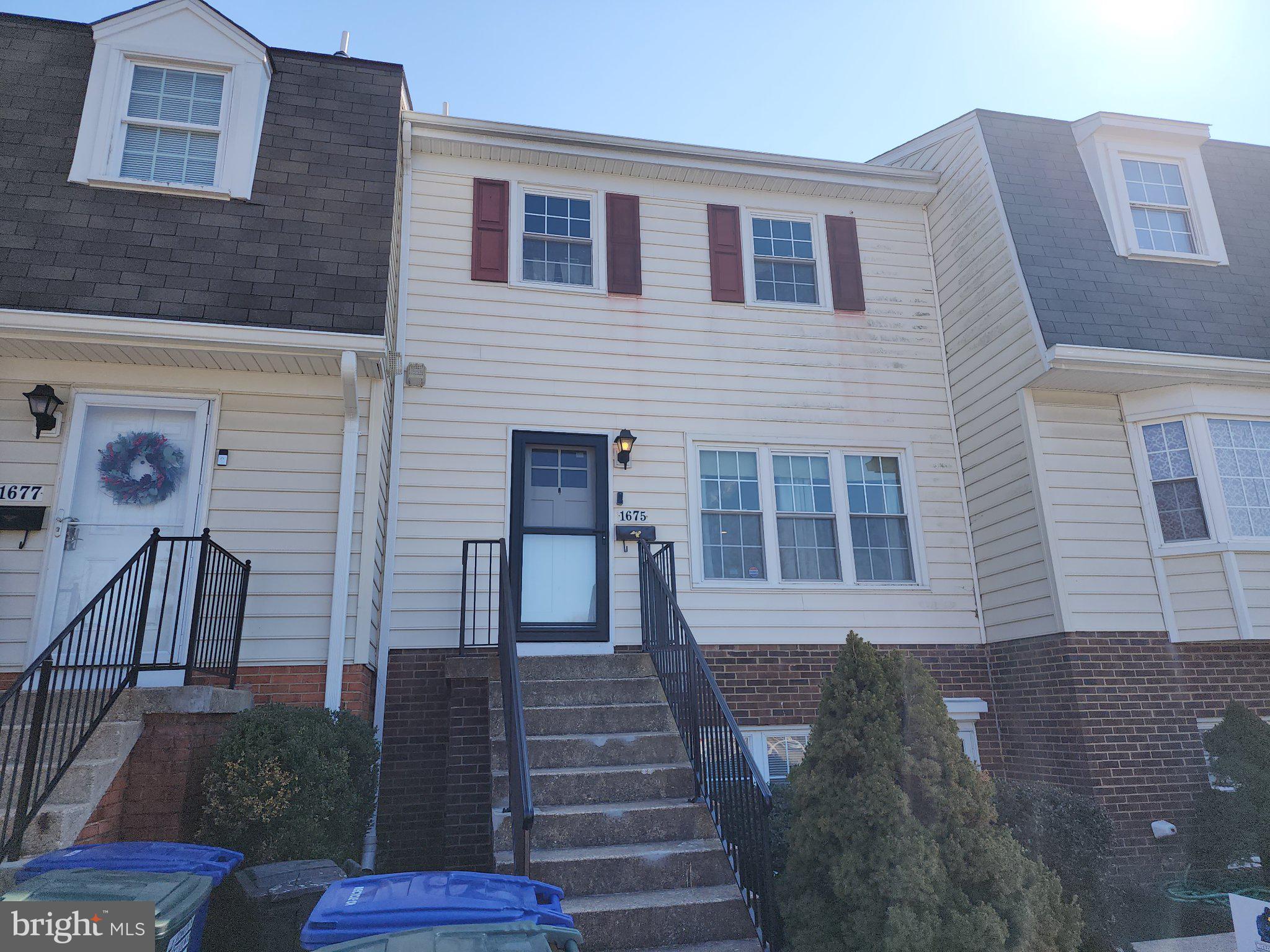 1675 Ridgely Court, Unit 182 Crofton, MD 21114 - Photo 7 of 47 a front view of a house with stairs