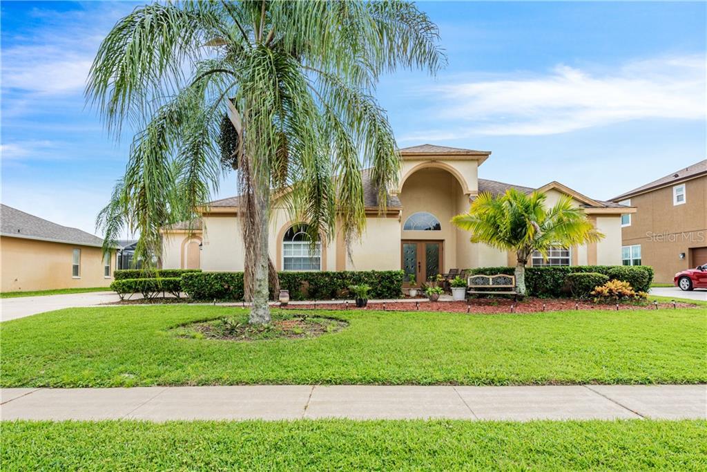 WELCOME HOME!! Lovely 4BD/2.5BA LAKEFRONT POOL HOME located in the GATED COMMUNITY of Osprey Lakes and ZONED for TOP A-RATED OVIEDO SCHOOLS!