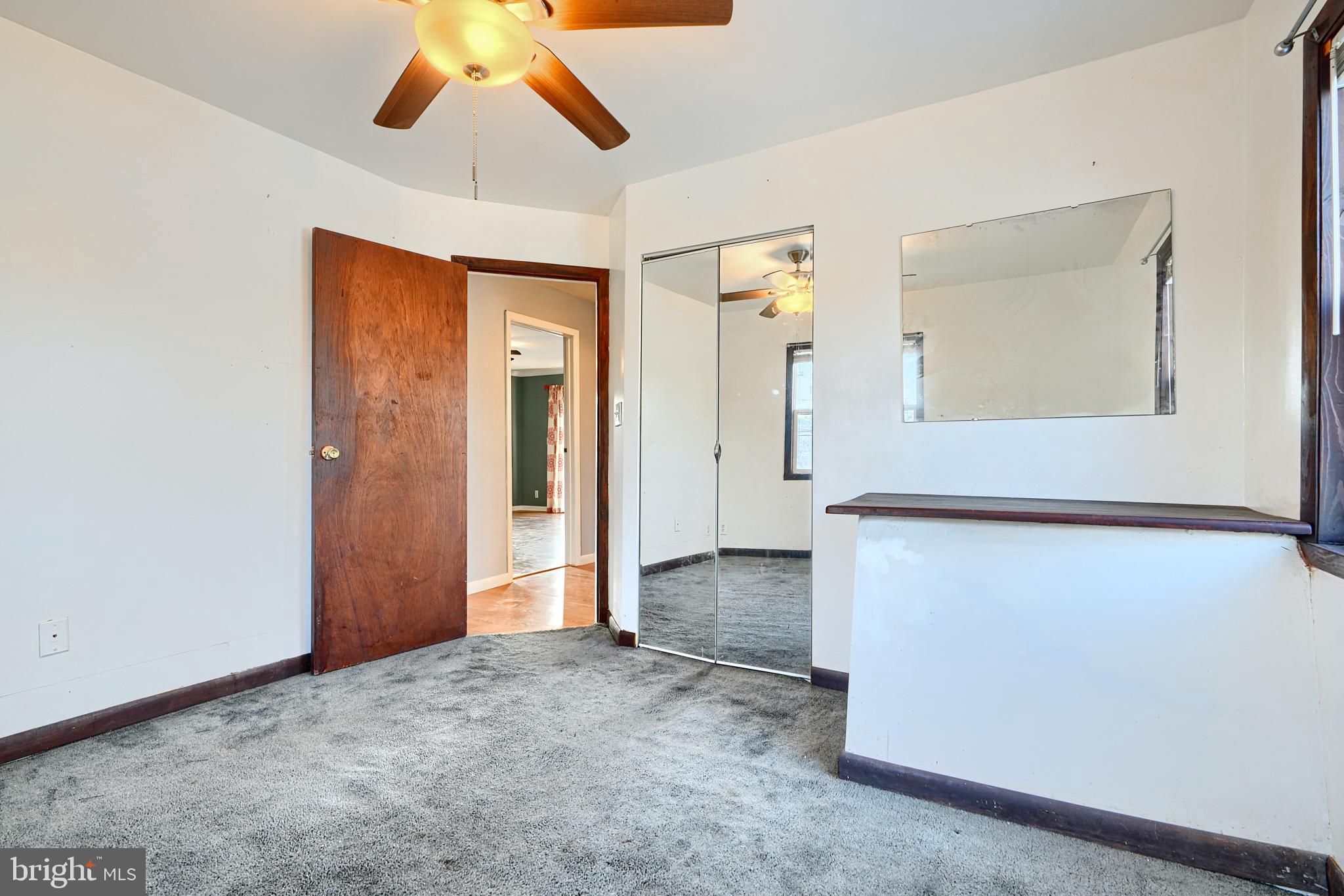 7703 Meath Road Dundalk, MD 21222 - Photo 23 of 45 a view of empty room with window
