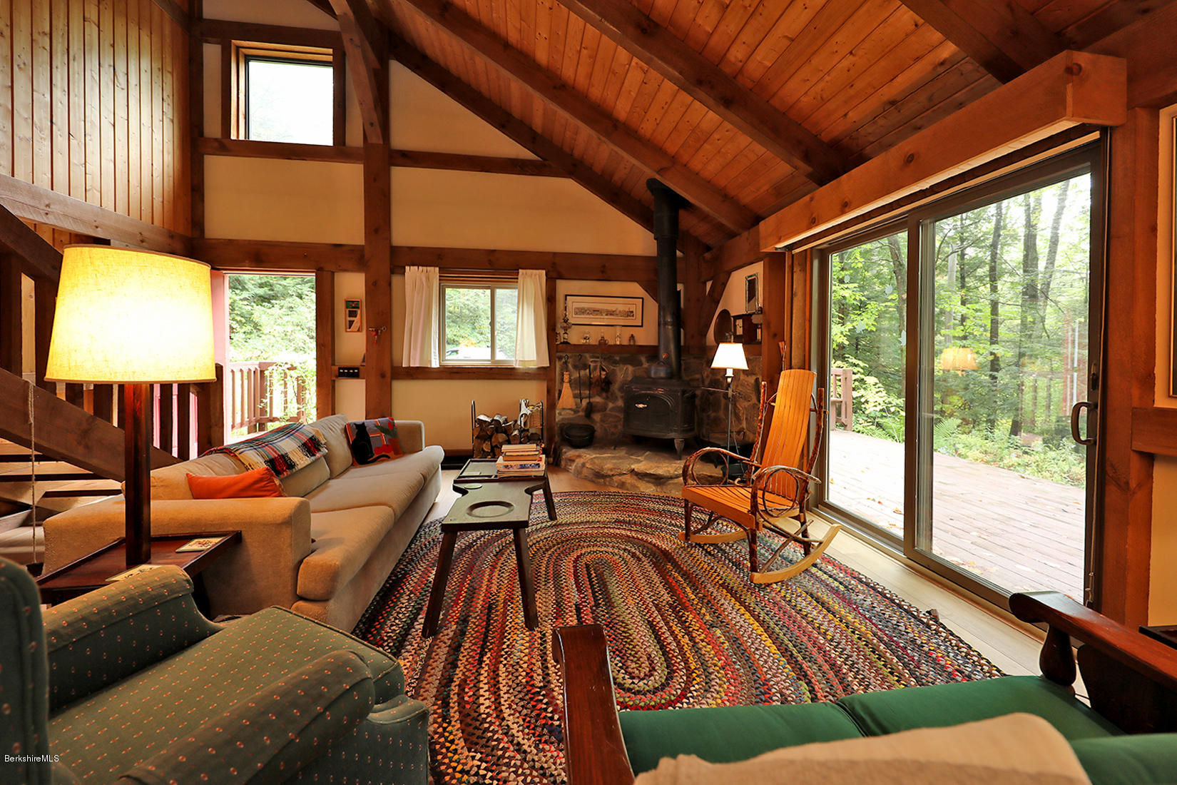 66 Ray Hubbard Road Otis, MA 01029 - Photo 2 of 21 a living room with furniture a large window